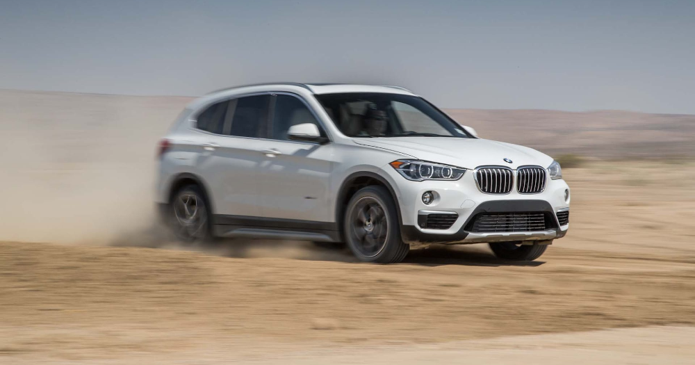 2016-BMW-X1-xDrive28i-front-three-quarter-in-motion